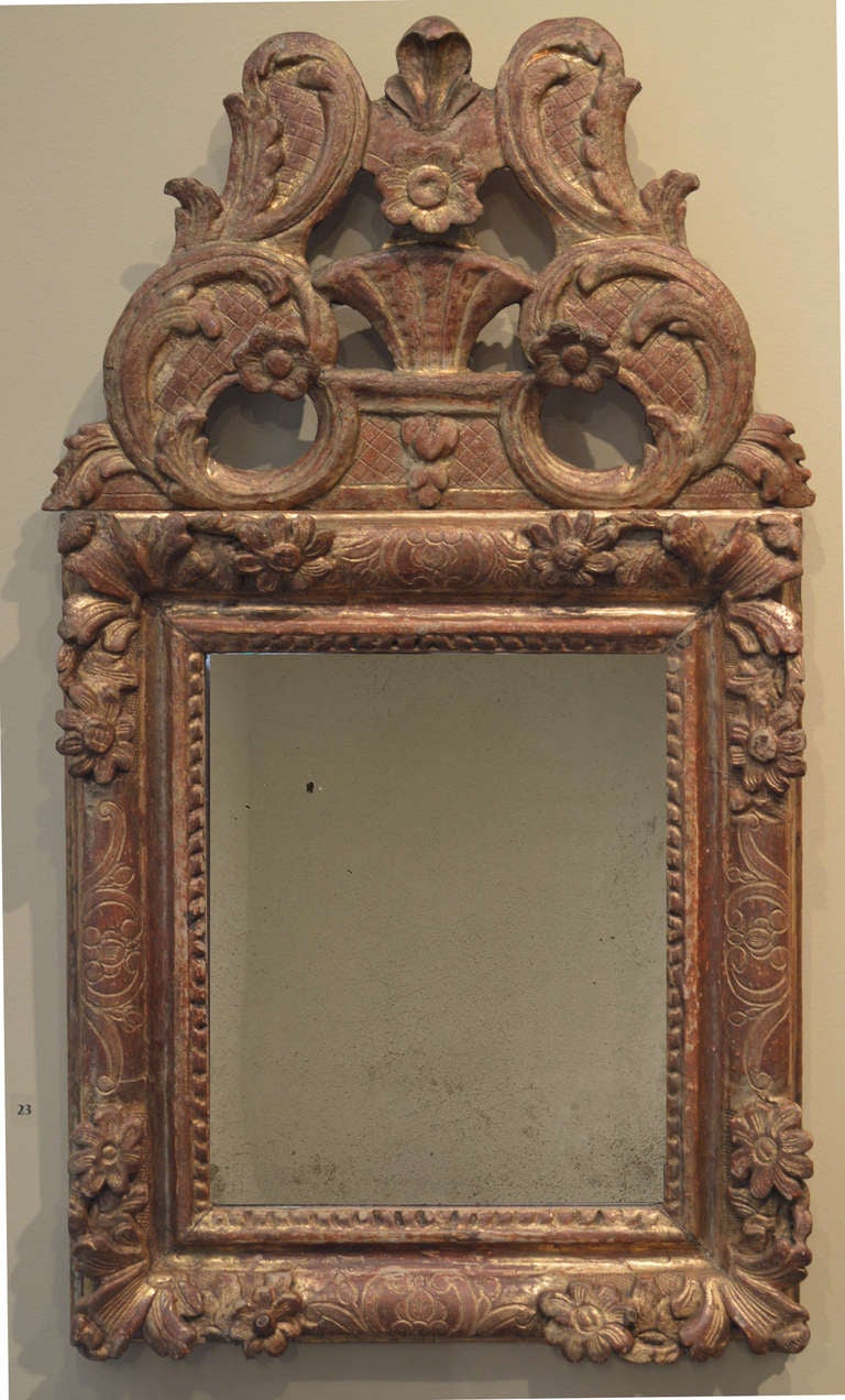 Hand-carved gilded mirror, circa mid-18th century.
