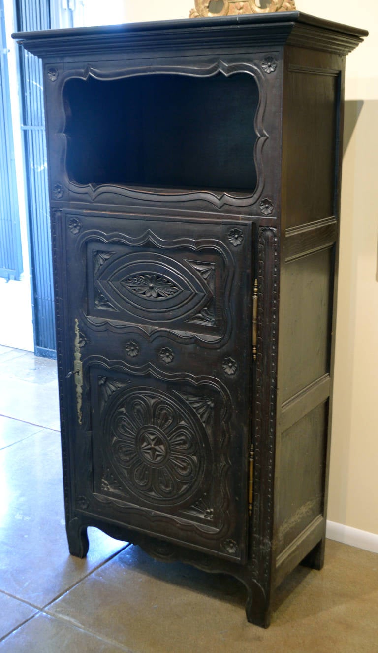 Beautifully hand-carved cabinet from the area of Brittany, France.
circa 1900.