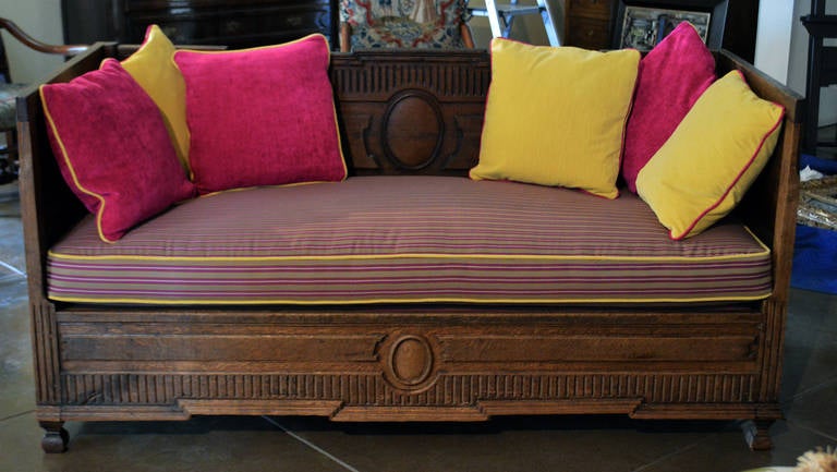 Unique solid oak sofa. Very unique style.
Upholstery selected by Timothy Corrigan. He has been named one of the world's top 100 interior designers by Architectural Digest and one of the world's top 40 designers by The Robb Report.