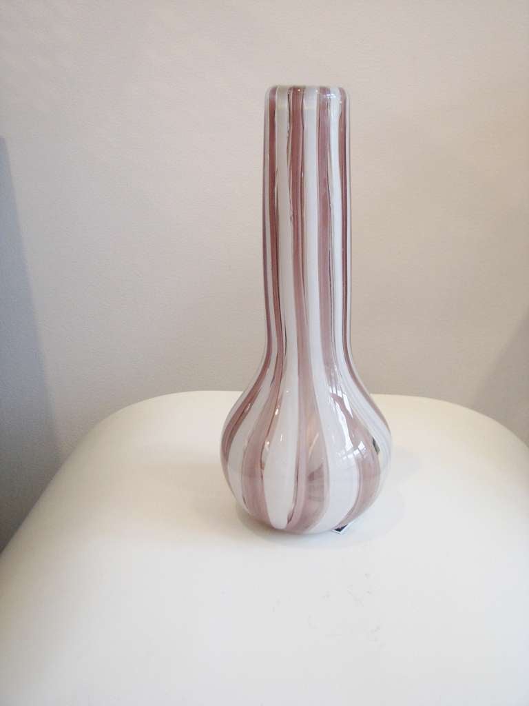 Extremely heavy pink and white striped Murano glass vase.