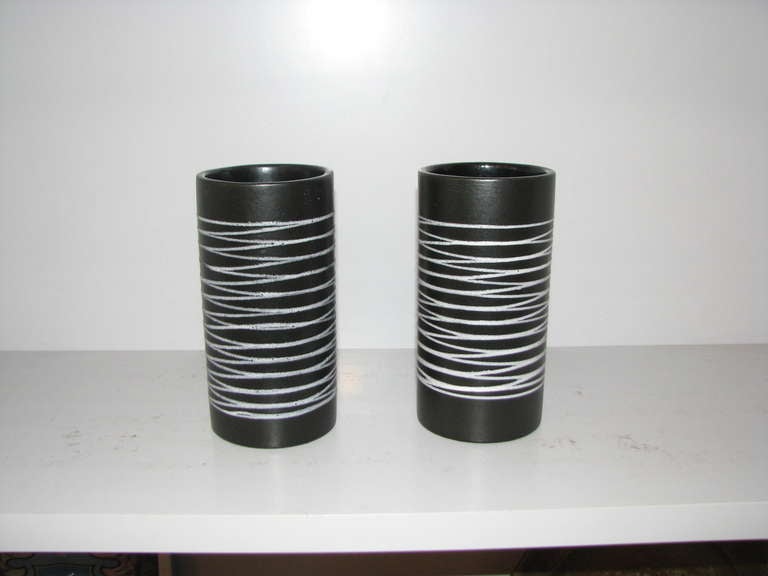 Haeger black pottery vase with white stripes. There are two available and priced separately