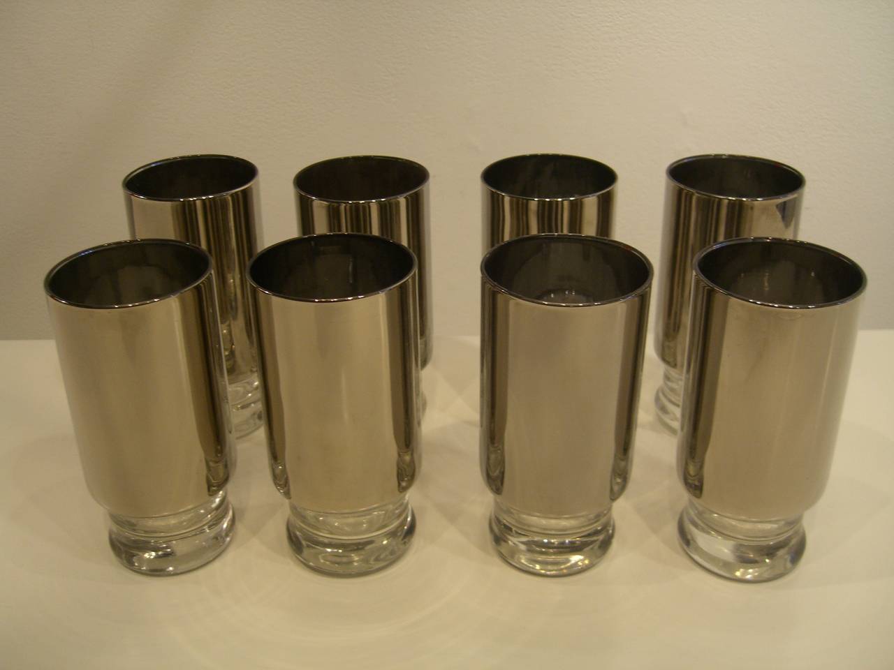 Set of eight silver highball glasses from the 1970s. Fantastic look, unmarked.