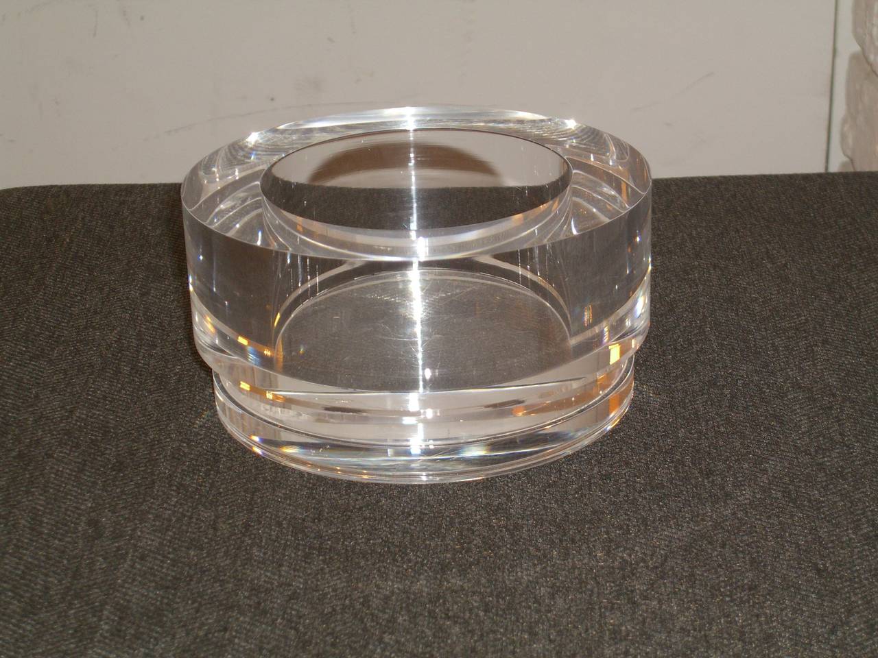 Very heavy Lucite bowl. Super clear and clean.