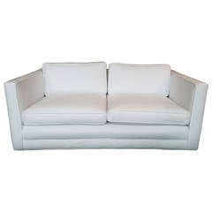White Upholstered Low Back Loveseat