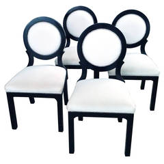 Set of Four Hollywood Regency Black and White Circle-Back Dining Chairs
