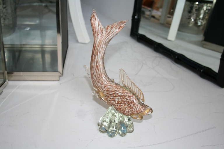 Murano koi fish with brown/white/gold colorings. Very heavy on clear glass base.