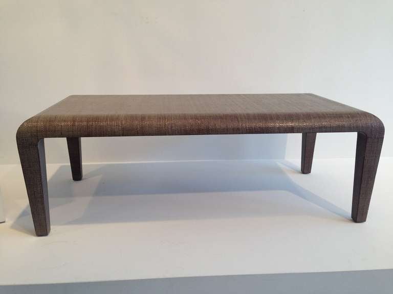 Harrison Van Horn rattan coffee table in a plum color with very faint blue undertones.