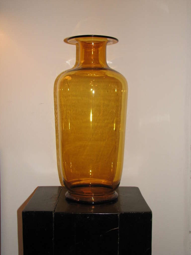 Very large Indiana Glass Co amber colored urn shaped vase.