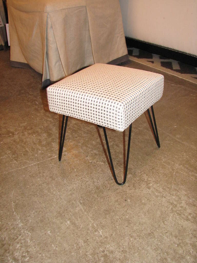 1950's hairpin leg footstool with new upholstery.