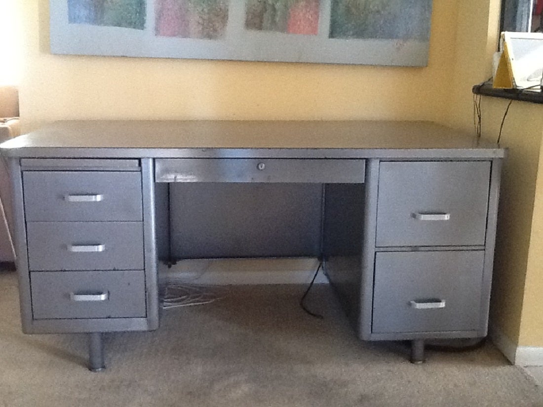 Mid Century Tanker Desk made by Steelcase in the USA. Lots of storage space .