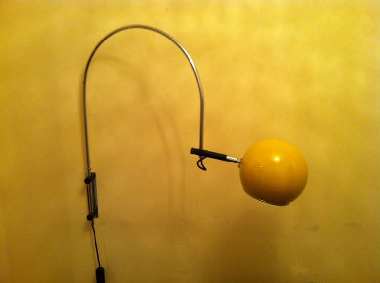 Wall mounted lamp,The pole and the shad are revolving and adjustable. 
The lamp is newly rewired.