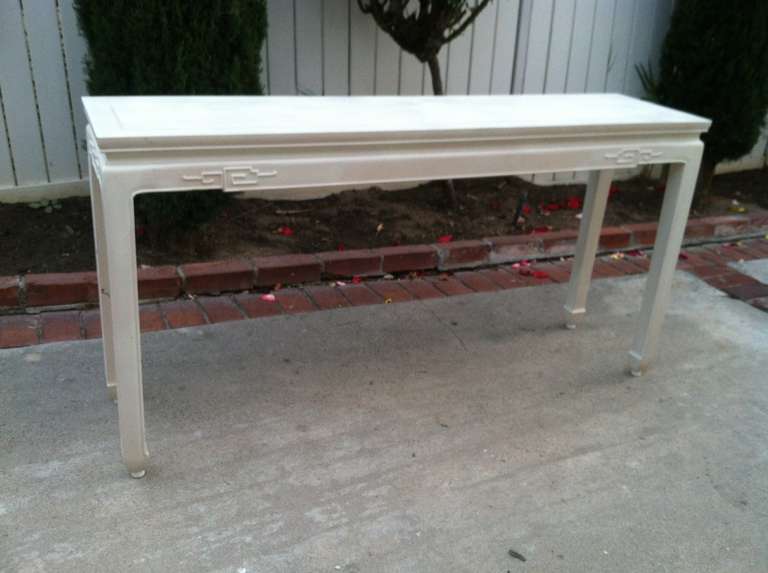White painted Asian style sofa Table in Baker style. 
If interested we have an additional matching sofa Table for sale.