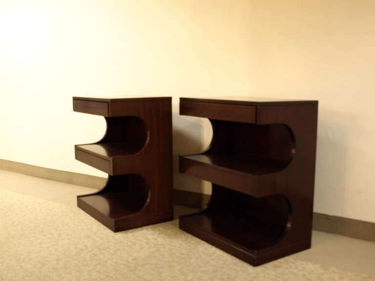 Pair Mahogany Side Tables with three tiered Shelves and two Drawers.