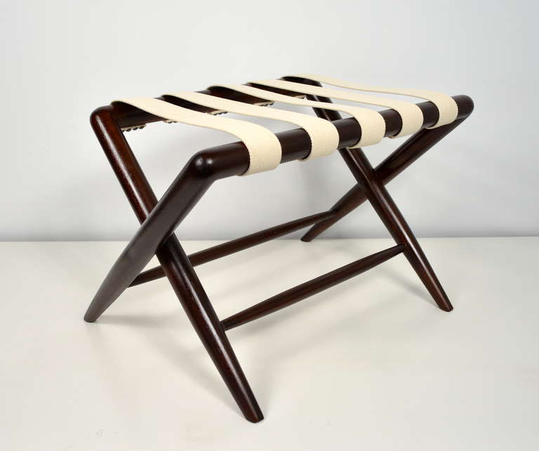 A folding luggage rack designed by T.H. Robsjohn Gibbings for Widdicomb.  Solid mahogany construction.  Newly refinished.