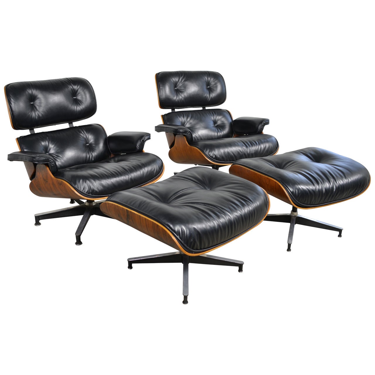 Pair of Eames 670/671 Lounge Chairs and Ottomans in Rosewood