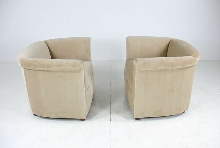 A pair of club chairs by Ward Bennett for Brickel.  Newly recovered in velvet fabric.