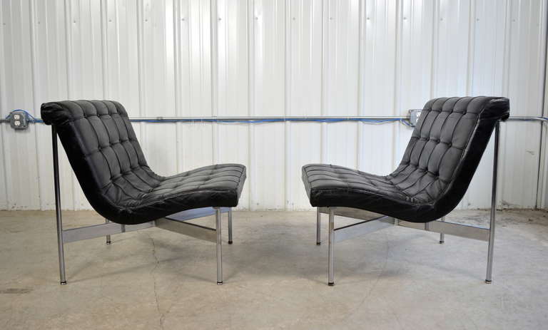 A pair of New York lounge chairs by Katavolos, Littell and Kelley for Laverne International.  Chromed steel frames.  Original black leather upholstery.