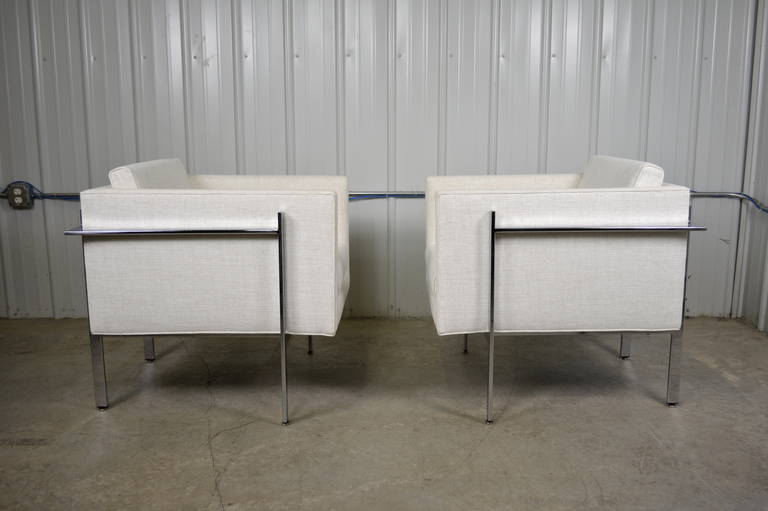 A rare pair of lounge chairs designed by Milo Baughman for Thayer Coggin.  Unique chromed flat bar design.  Labeled.  Newly recovered.