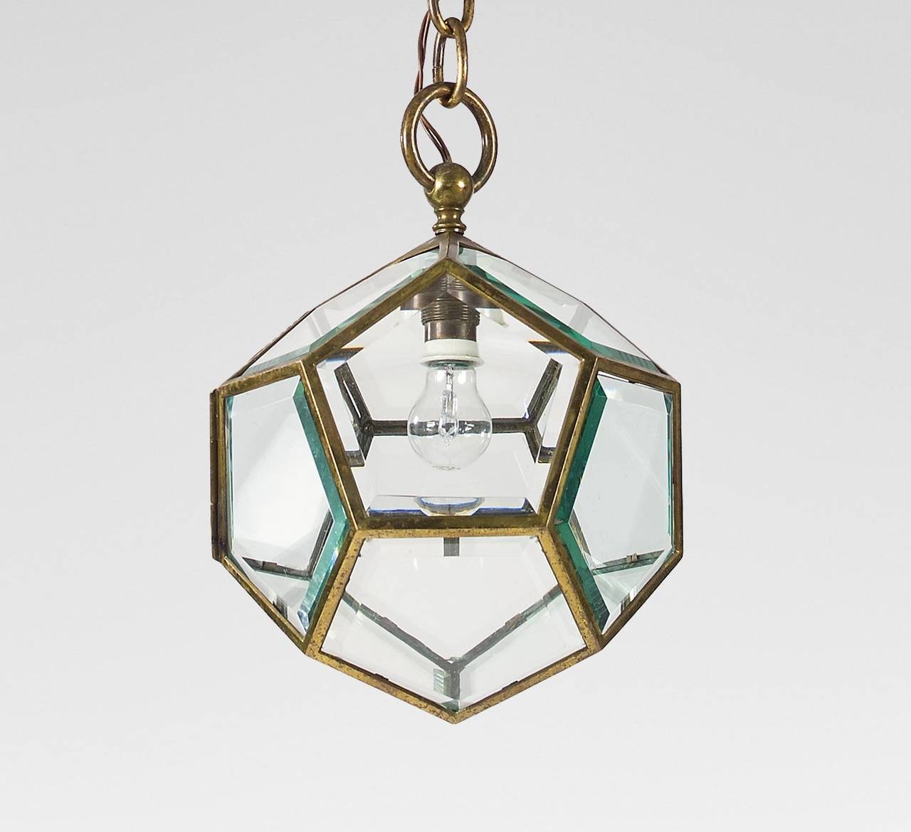 Hanging Lamp, design around 1905
Manufactured by Friedrich Otto Schmidt, Vienna
Brass, glass with facets, newly electrified
A bigger model was used by Adolf Loos for the interior decoration of the Paris branch of the Viennese tailor Knize.
L 126