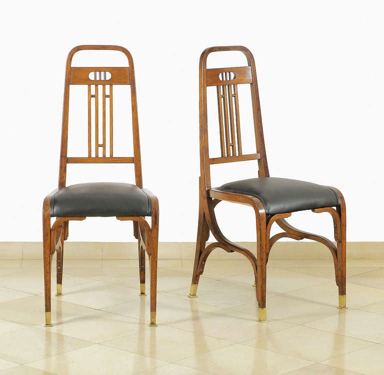 Two chairs with new leather upholstery