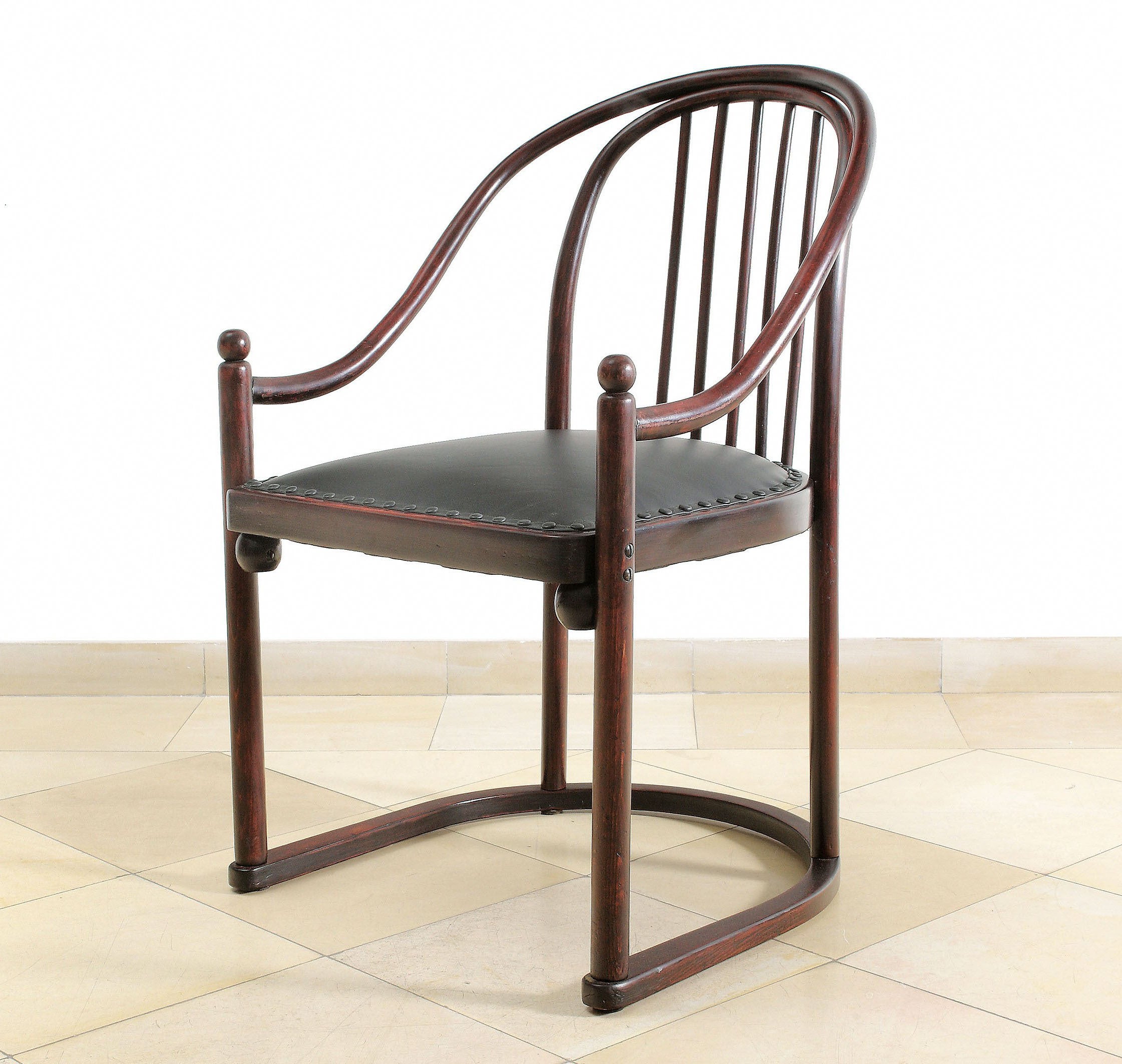 Bentwood armchair with new leather upholstery For Sale