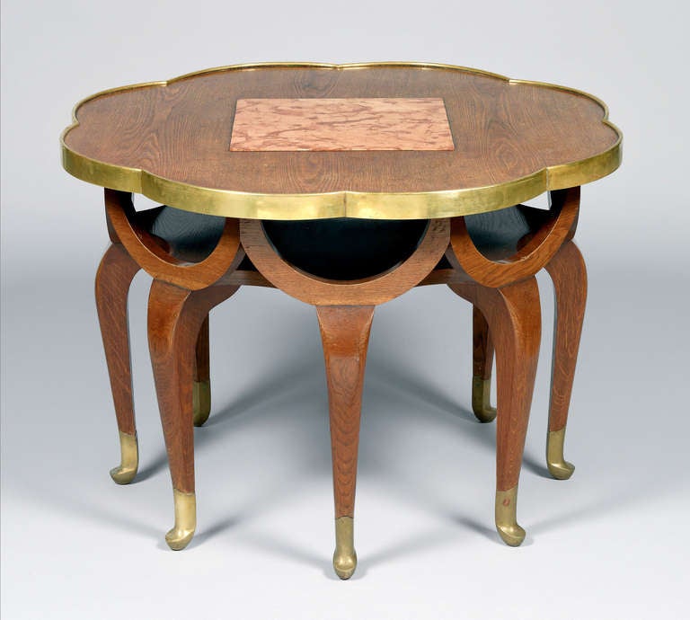 Eight Legged Elephant Trunk Table, designed by Adolf Loos, manufactured by Friedrich Otto Schmidt, Vienna
Oak, stained brown, brass fittings and brass feet, red-brown marbled stone inlay
Around 1900
H 65.5 cm, D 95 cm
Lit.: cf Eva B.