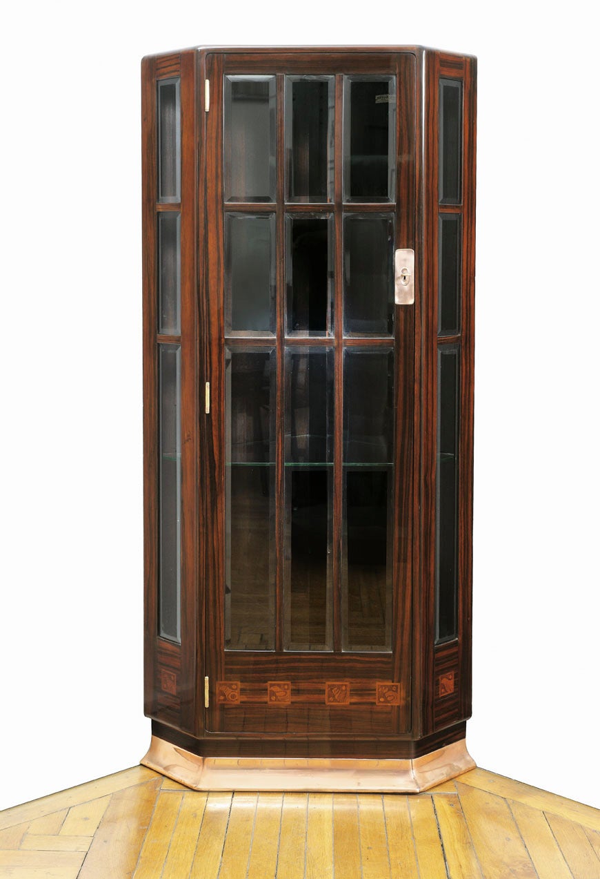 Two Corner Cabinets, design circa 1900
Design Robert Fix
Macassar ebony, solid and verneered, geometric inlays, cut glass, copper fittings and strips
Marks inside and on the reverse: metal plates and stamps Portois & Fix, Wien, Schl. No: 7291