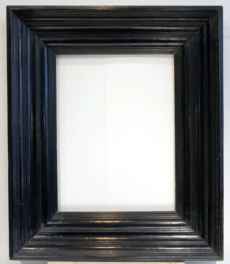 PERIOD FRAME 17th-18th century Italian (Dutch style) frame, macassar ebony, carved wood, continuous molding, deep dimensional profile, original condition, original hanger verso. Excellent condition.
sight size (opening from front): 28” x