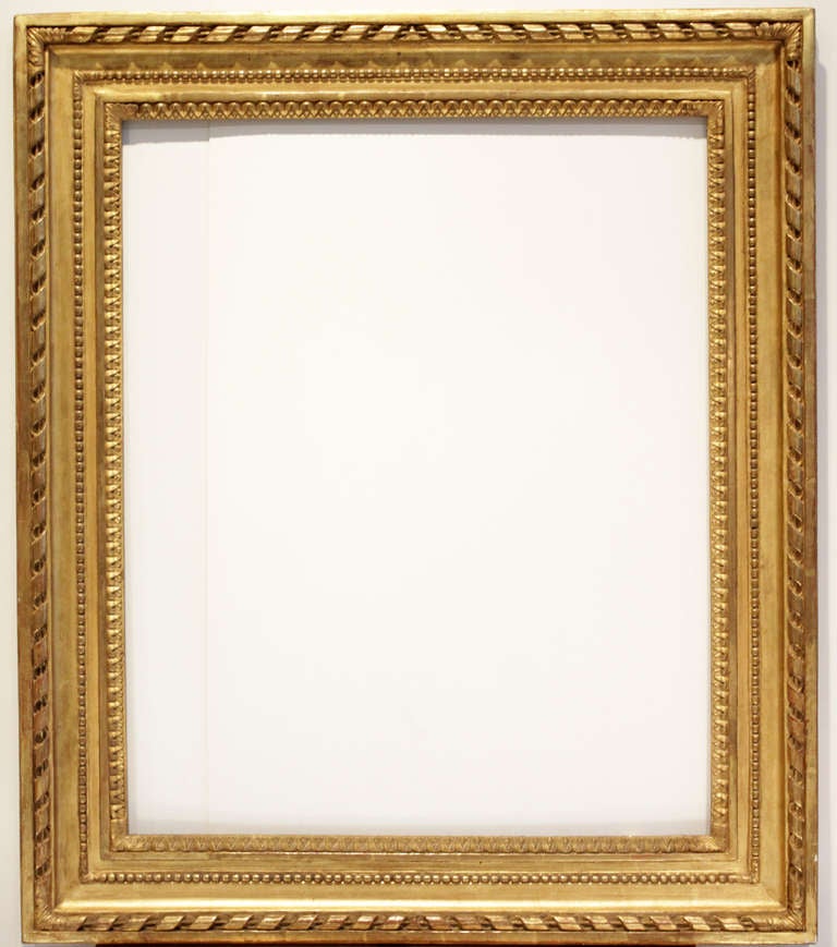 18th-century French Louis XVI frame, gilded oak, ribbon and stick with acanthus corners, panel with running pearl, lamb’s tongue sight edge with acanthus corners.
sight size (viewed from front): 28-3/4” x 23-1/2