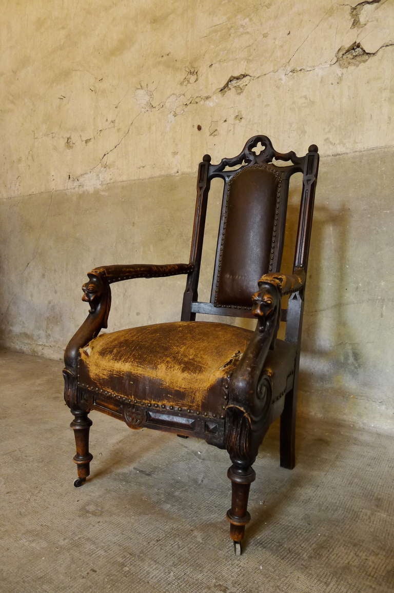 Enigmatic Gothic armchairs middle of the 19th century.

Dim = Hback 120 / Hseat 50 X 65 X 58 cm