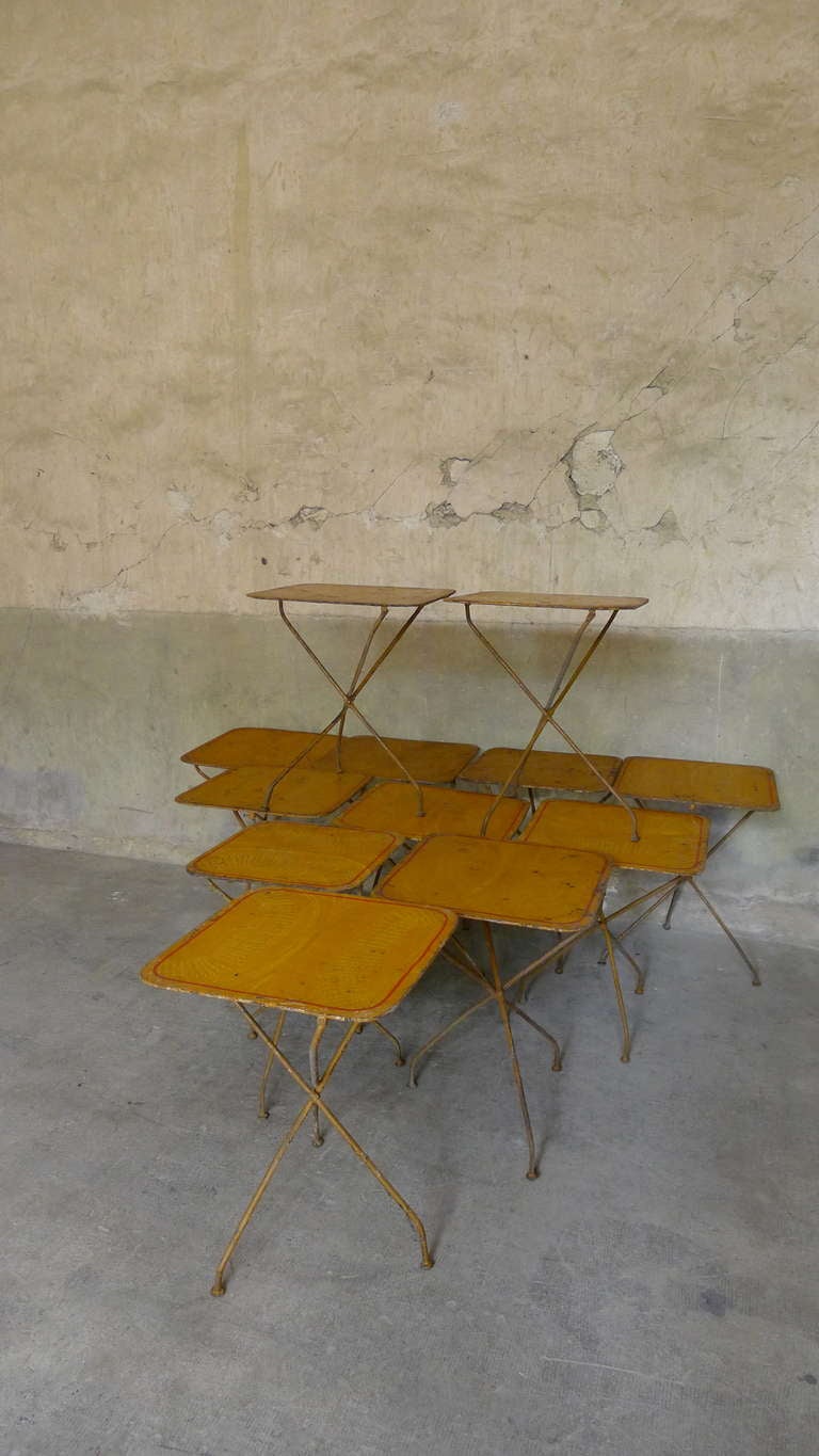 A Set Of 12 Folding Garden Tables