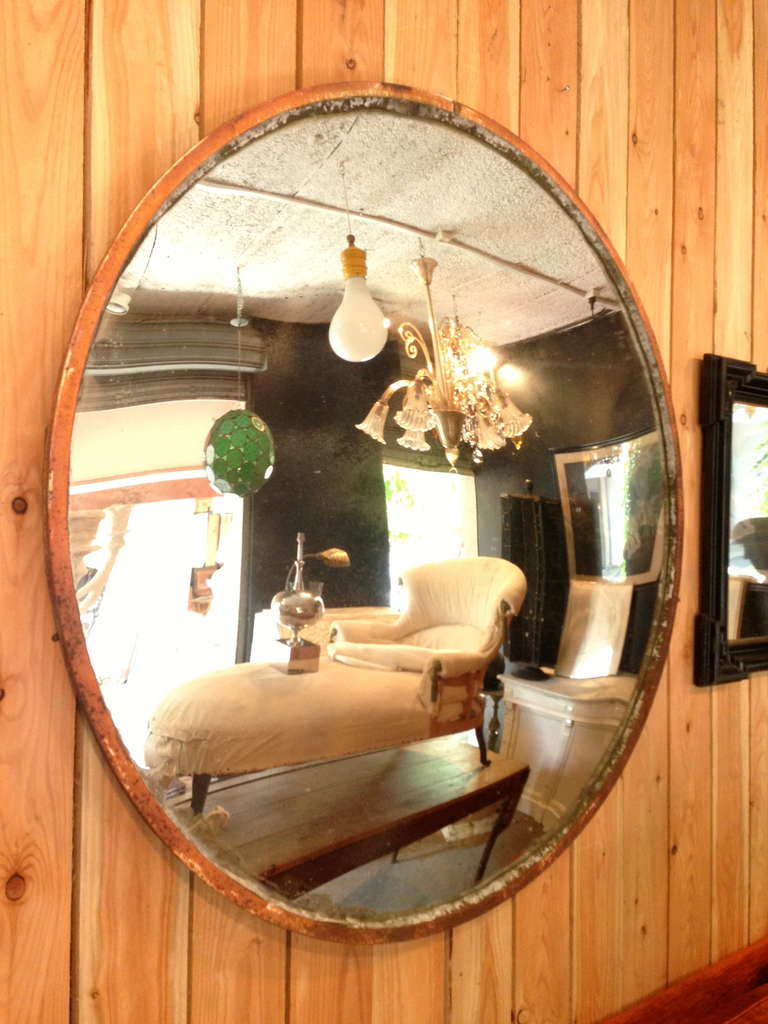 impresive large original convex mercury glass mirror with iron surround and lovely aged patina 

Diam = 123 cm x 3,8 cm