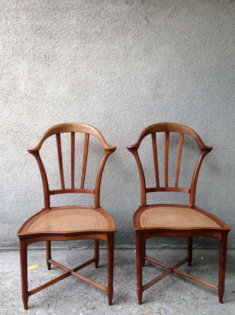 A nice design for this pair of chairs in walnut circa 1900.  Very good general condition.