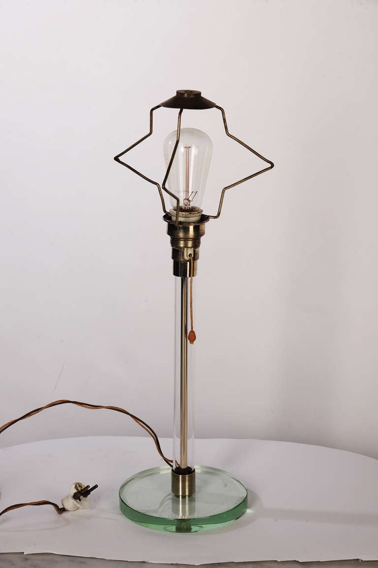 W a g e n f e l d & J u c k e r table lamp Bauhaus
Carl Jacob Jucker and Wilhelm Wagenfeld
C a r l J a c o b J u c k e r & W i l h e l m W a g e n f e l d table lamp from 1924/1925--WG -28 Bauhaus--glass and silver patinated metal with wooden pull