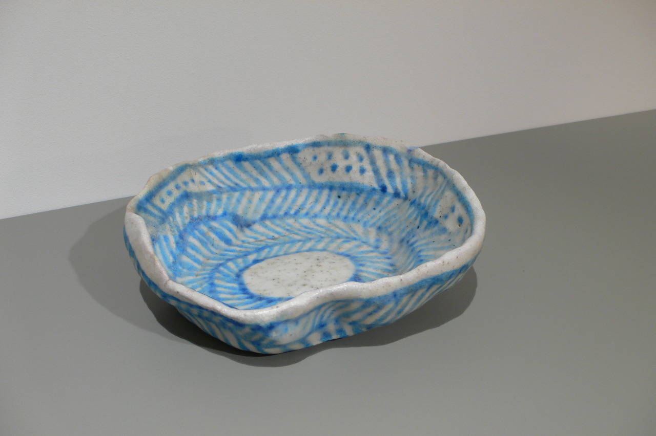 Bowl by Guido Gambone, Italy, circa 1950.

Crackle glaze bowl with blue pattern, signed with donkey mark and “Gambone Italy.”