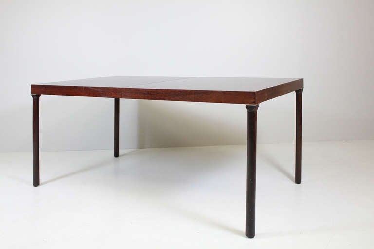 Danish Dining Table, ca 1960

top rosewood veneer,
legs solid wood,
construction aluminium