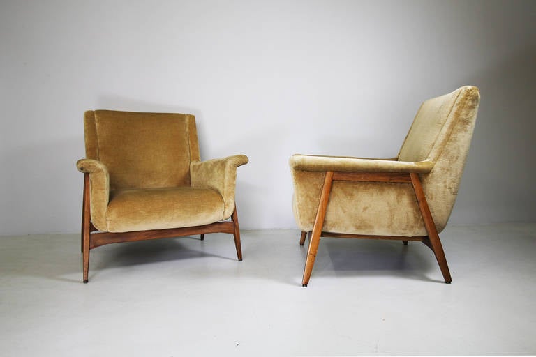 A pair of armchairs in the style of Gianfranco Frattini, Italy, circa 1958.