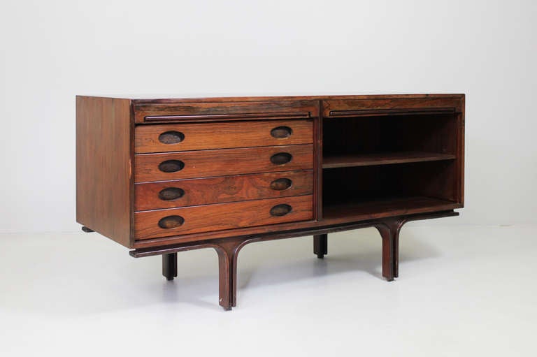 Sideboard by Gianfranco Frattini, Bernini Italy, 1961

Materials & Techniques Notes: rosewood, 
2 tambour style roll down fronts, 
4 drawers,
free-standing