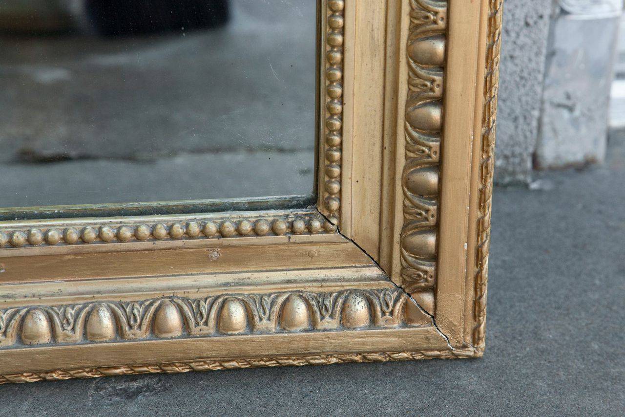 Late 19th Century Tall Gold Louis XVI Giltwood Full-Length Mirror with Crown of Ribbons