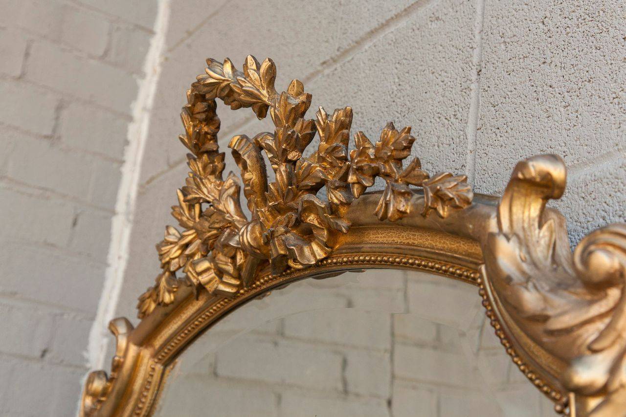 Late 19th Century 19th Century Louis XV Giltwood Mirror with Beveled Glass and Laurel Motif