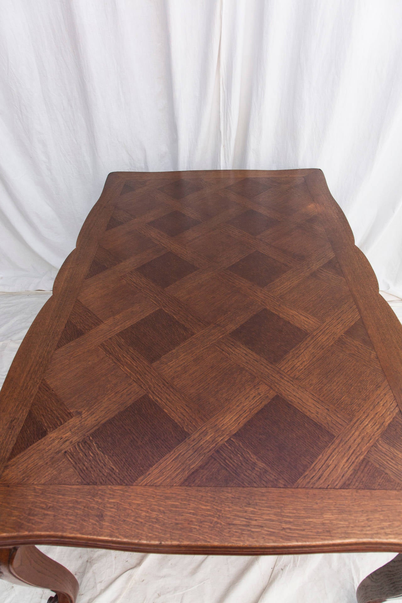 Oak Hand-Carved French Draw-Leaf Table with Parquet Top and Beveled Edge