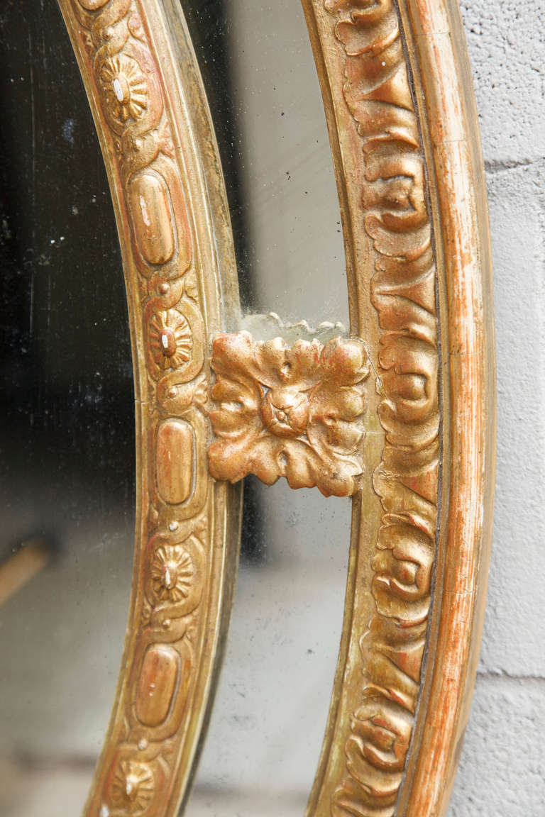 Grand French Napoleon III Period Louis XVI Style Mirror with Ornate Torch and Arrow Carving In Excellent Condition In Fayetteville, AR