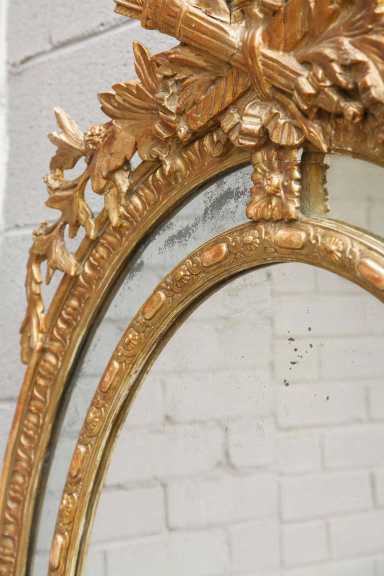 Grand French Napoleon III Period Louis XVI Style Mirror with Ornate Torch and Arrow Carving 1