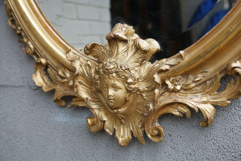19th Century Napoleon III Period Gilt Oval Regency Mirror with Face