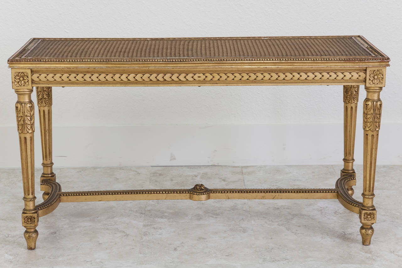 gold piano bench