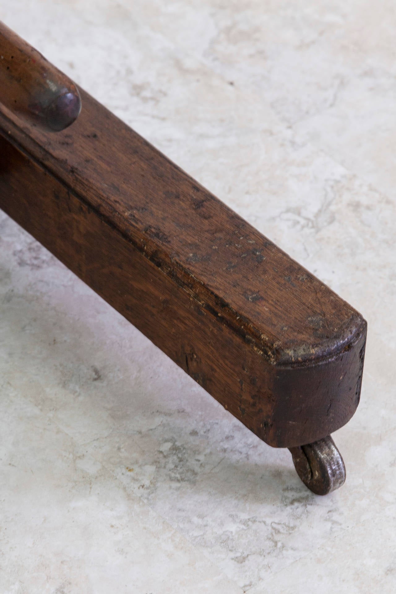 This late 19th century oak artist's easel has its original functioning crank mechanism to adjust the tray height.  With a clever extendable notched catch at the top for multiples or deep edge canvases, this easel can handle impressively large