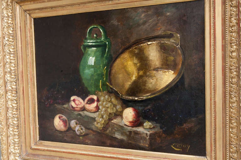 Oil on canvas by Jules LeRoy (1833-1865) in period gilt wood frame.  Still life with fruit, green faience cruche, and copper cauldron.