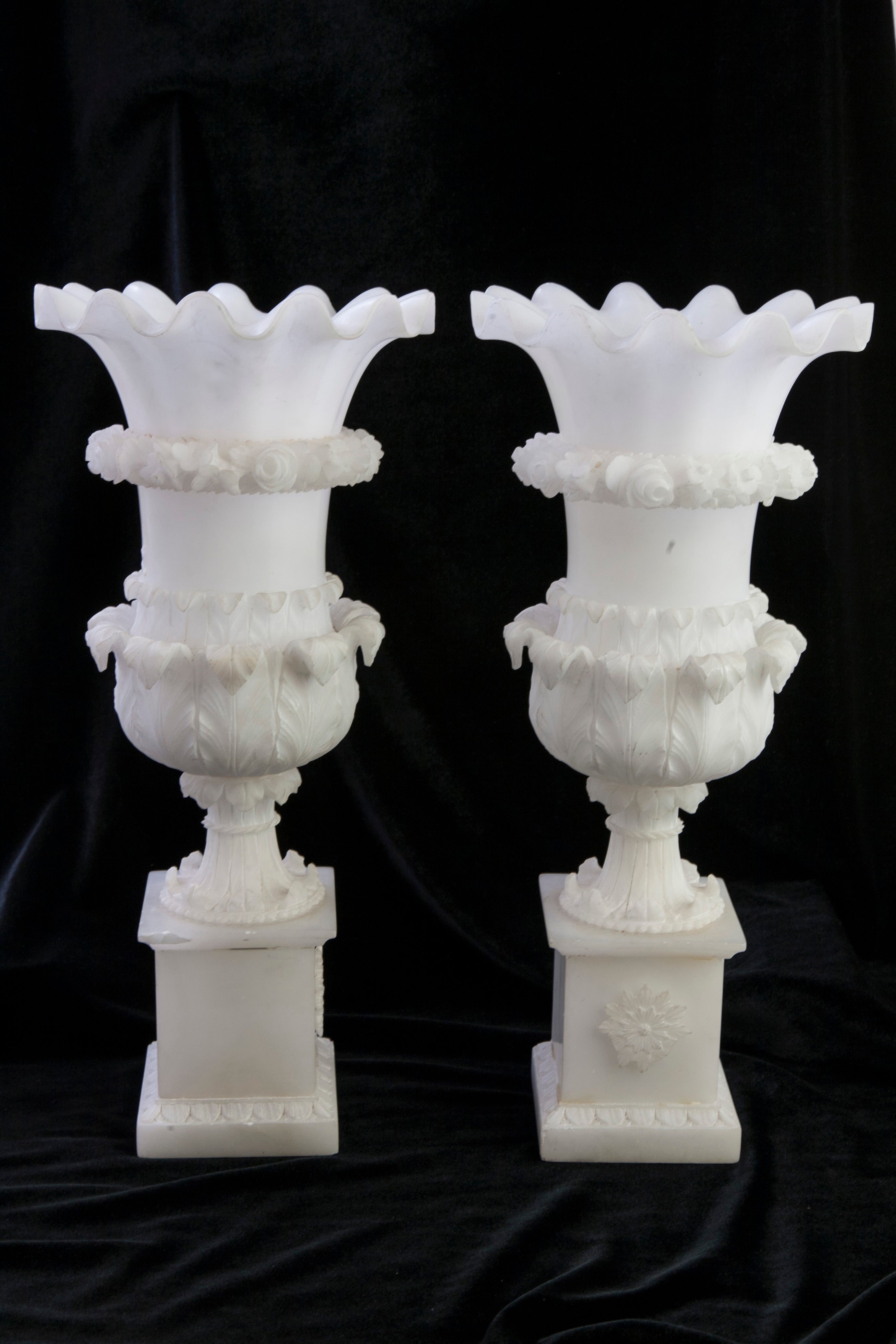 Pair of 19th Century Carrera Marble Urns in Acanthus Motif