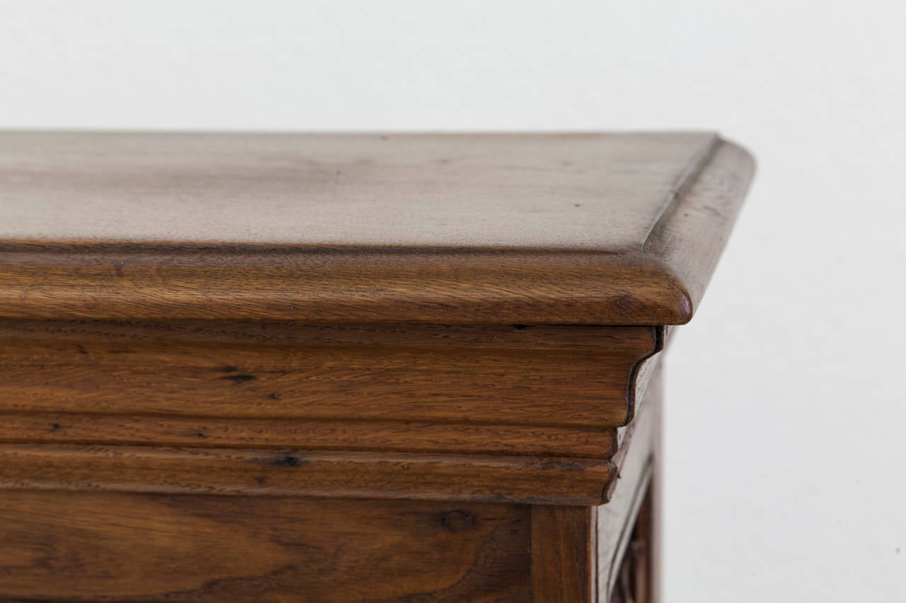 This pair of hand pegged oak columns were made from hand-carved 19th century boiseries elements with linen fold motif. A popular motif of the Gothic era, linen fold enjoyed a revival in the mid-19th century. These handsome columns will make a grand