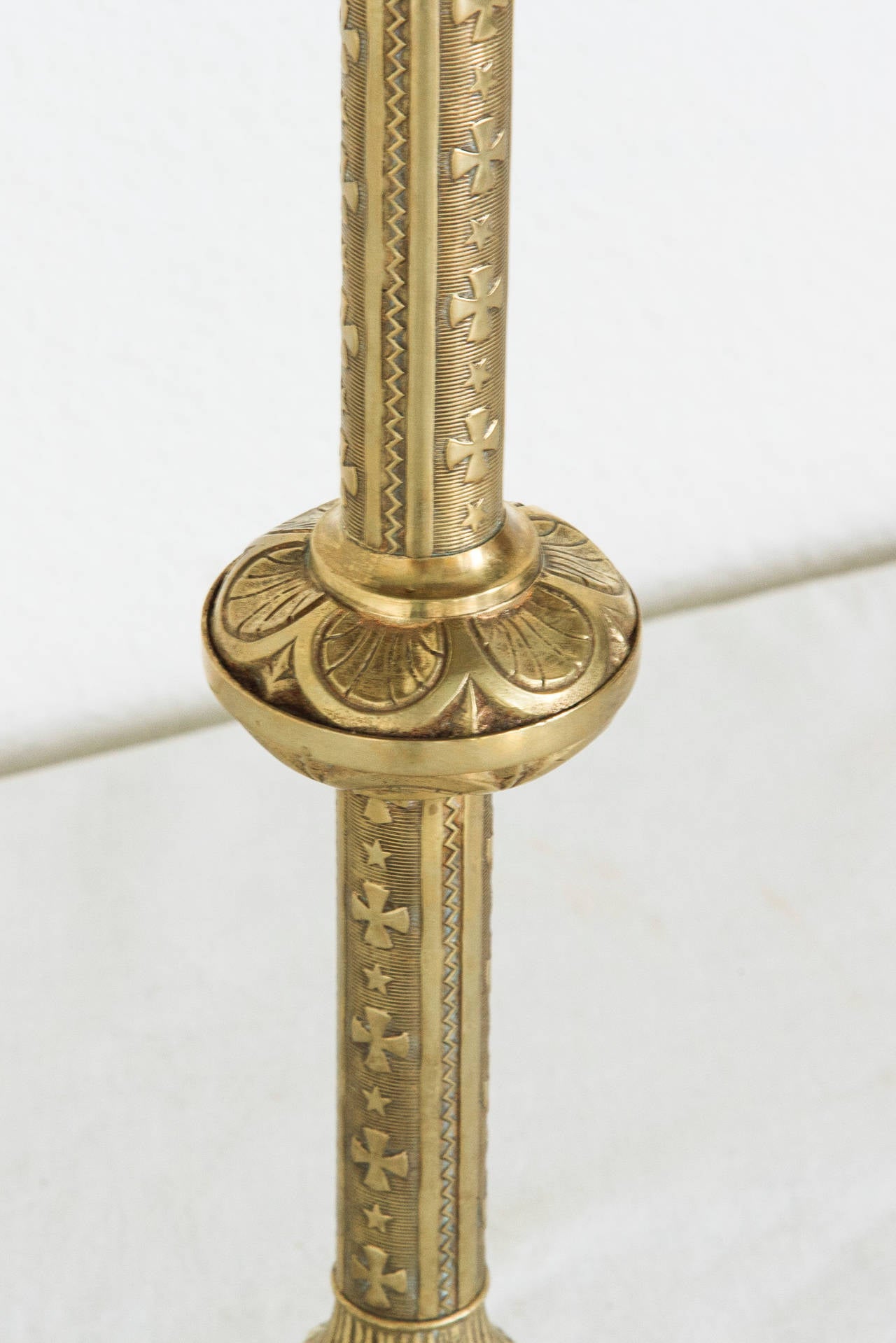 This unique and beautifully detailed piece was originally an altar candlestick for a French chapel. It has been turned upside down, and the base has been transformed into a table surface with antiqued mirror. A versatile little side table for a